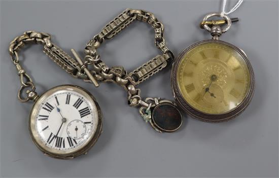 A large late Victorian silver pocket watch by John Forrest, London, one other silver pocket watch and an albert.